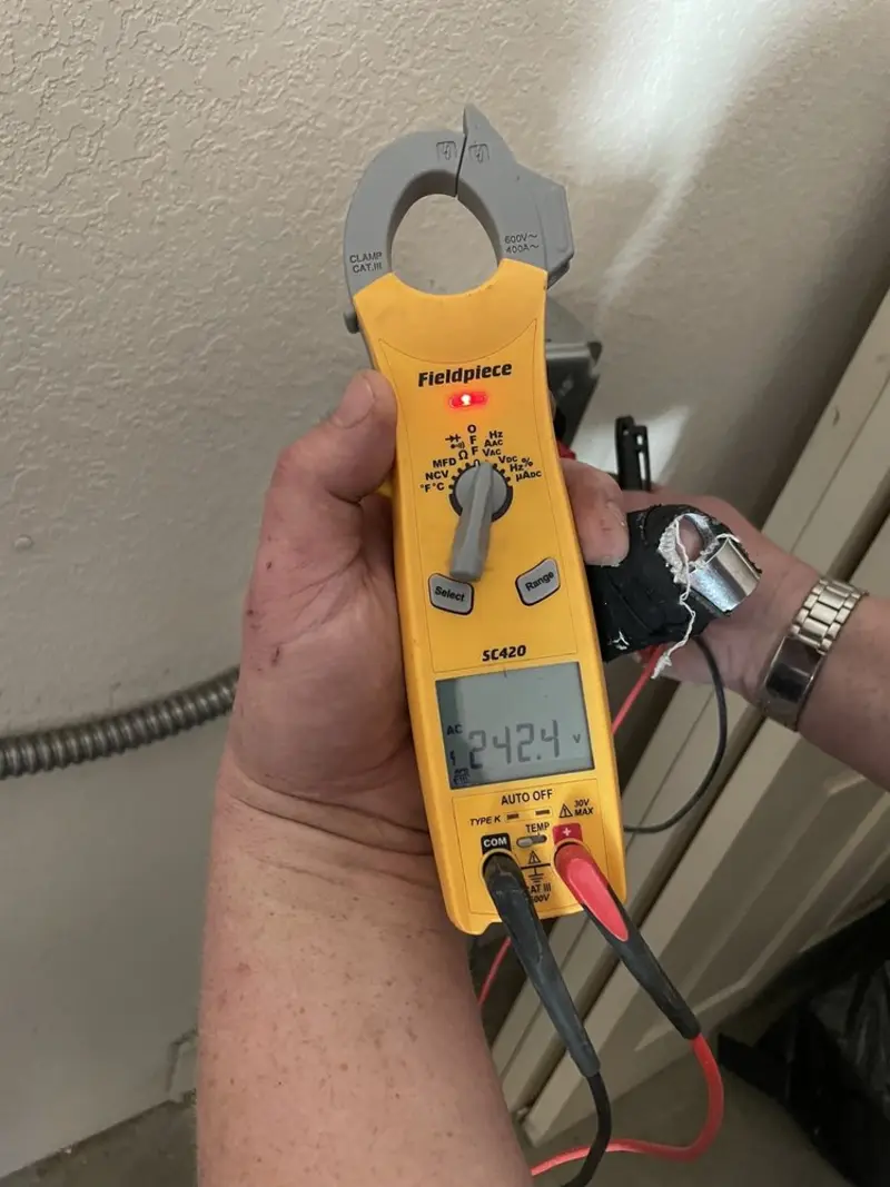 Voltage testing with clamp meter during Generator Installation in Cudahy
